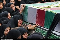 خاکسپاری پیکر شهدای گمنام در میدان امام حسین(ع)