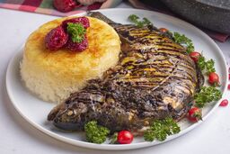 طرز تهیه ماهی شکم پر مجلسی با سبزی های معطر و محلی